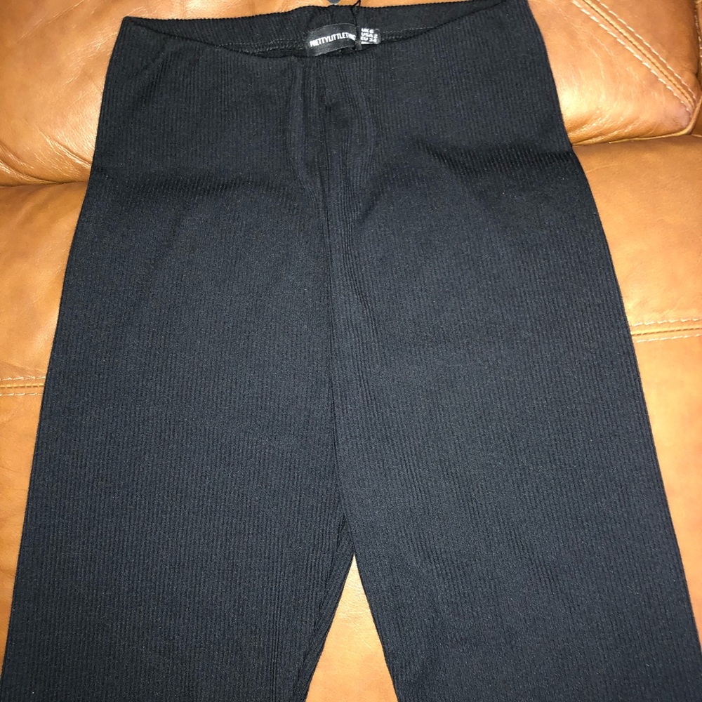 Biker shorts, knee-length. Size 2